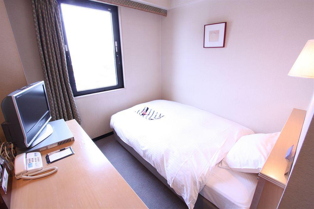 APA Hotel Tonami-Ekimae Bagian luar foto