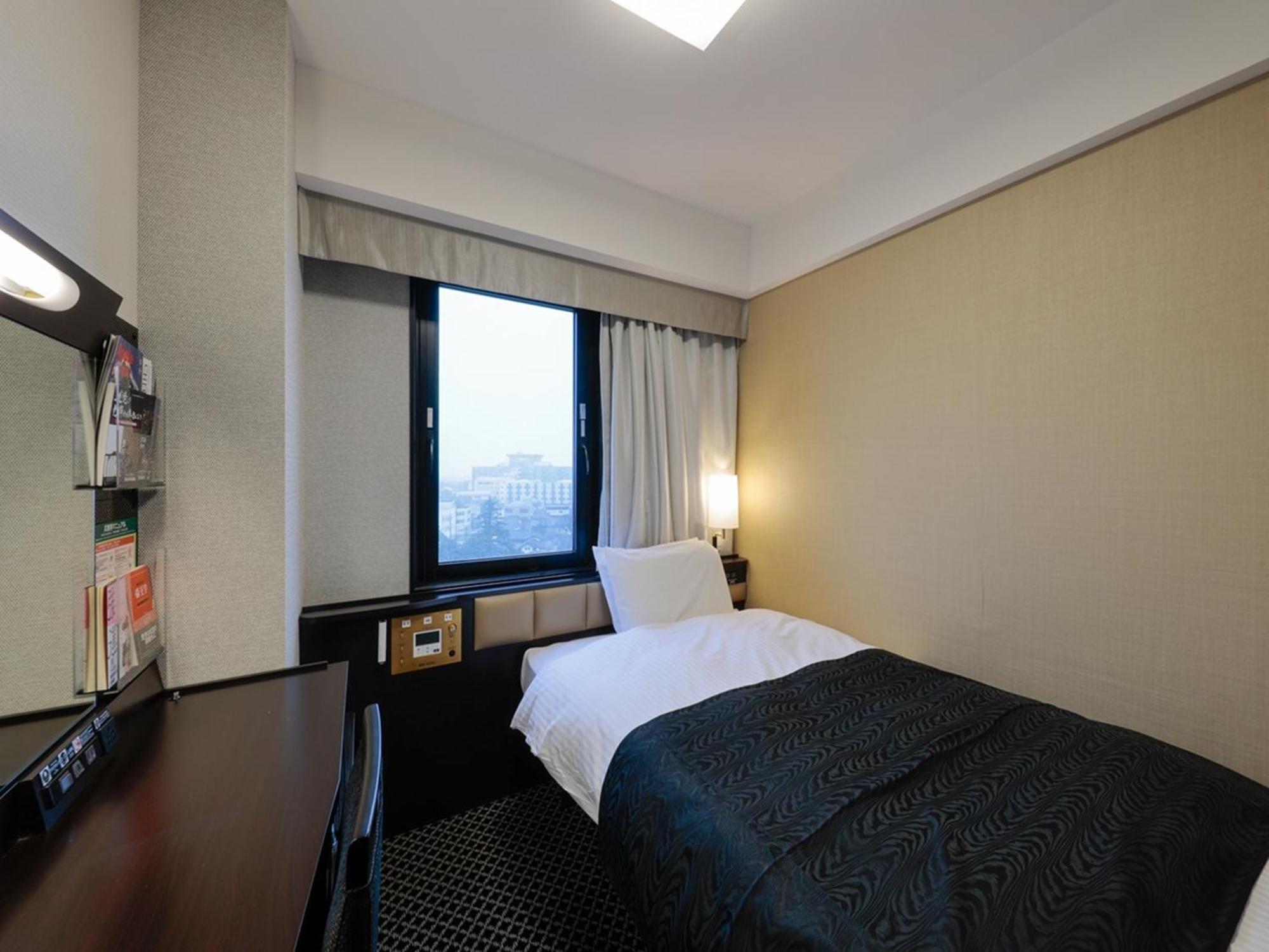 APA Hotel Tonami-Ekimae Bagian luar foto